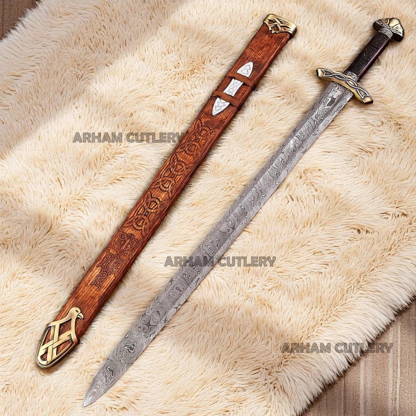 Hand-forged Viking Damascus steel sword with engraved wooden scabbard and ornate brass fittings displayed on a dark wooden background