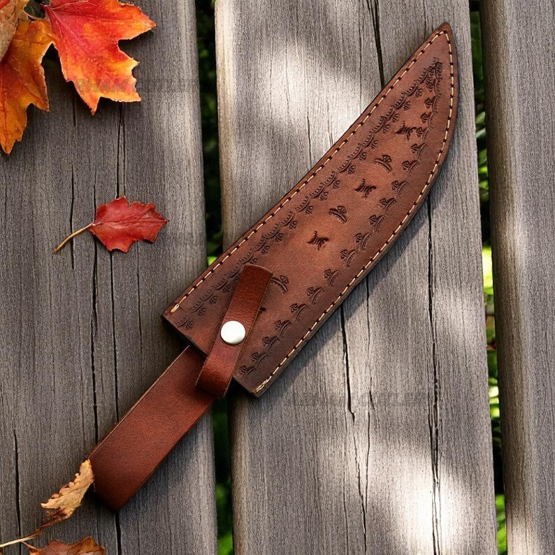 D2 steel survival knife with brass guard and wood handle standing upright outdoors – Arham Cutlery