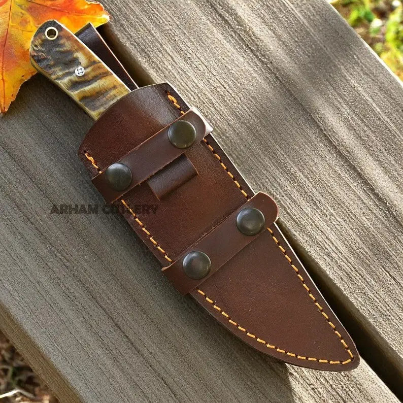 Handmade hunting knife with ram horn handle in a premium brown leather sheath – Arham Cutlery