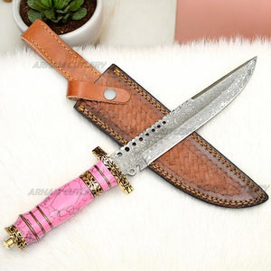 Damascus Steel Bowie Knife with Pink Turquoise Stone Handle and Brown Leather Sheath on White Fur Background