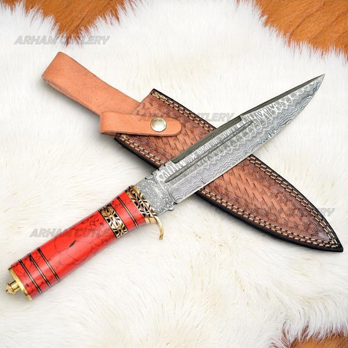 Handmade Damascus Bowie Knife with Red Turquoise and Brass Handle and Leather Sheath on Fur Background