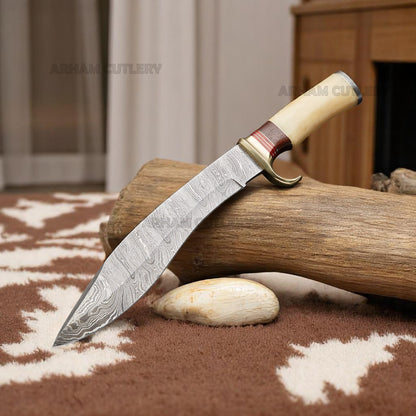 Handmade Damascus steel Bowie knife with bone and rosewood handle beside custom leather sheath – Arham Cutlery