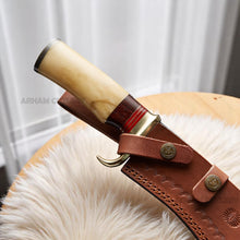 Cargar imagen en el visor de la galería, Handmade Damascus steel Bowie knife with bone and rosewood handle beside custom leather sheath – Arham Cutlery
