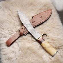 Cargar imagen en el visor de la galería, Handmade Damascus steel Bowie knife with bone and rosewood handle beside custom leather sheath – Arham Cutlery
