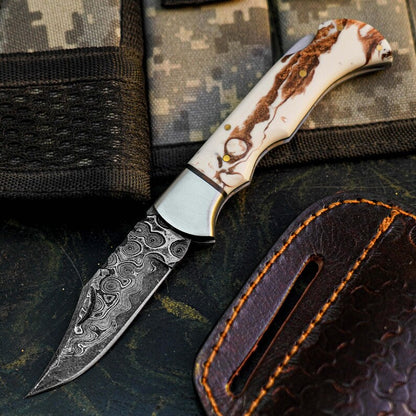 Handmade Damascus Hunting Knife with Patterned Resin Handle Arham Cutlery