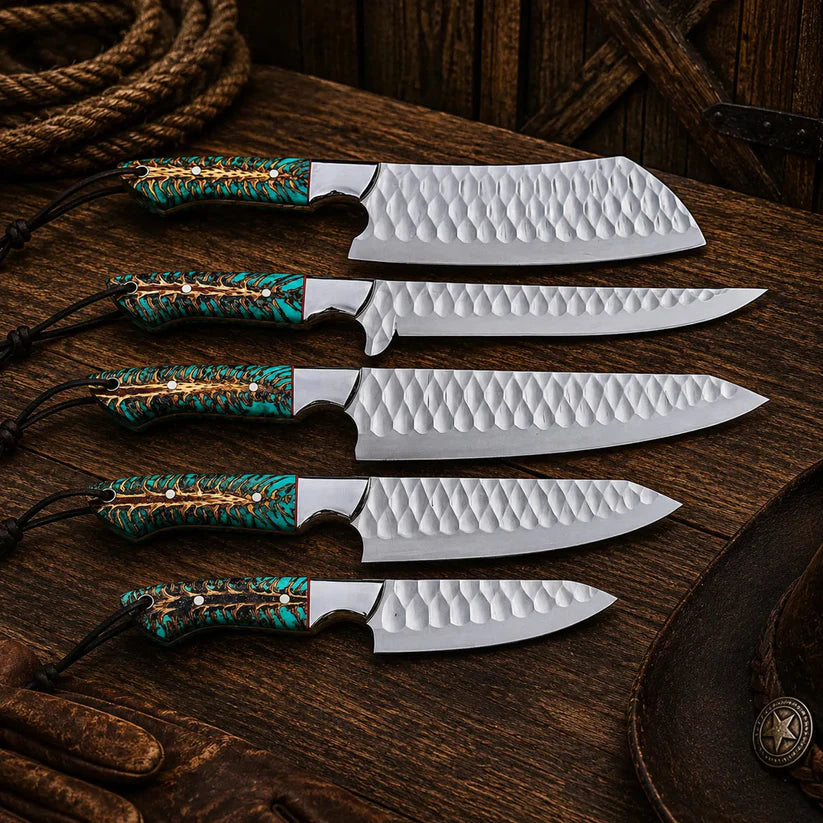 Set of knives with decorative handles on a wooden surface