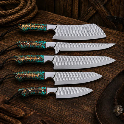 Set of knives with decorative handles on a wooden surface