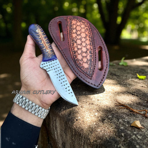 Arham Night Talon handmade knife with pine cone resin handle and rasp file blade, displayed with leather sheath