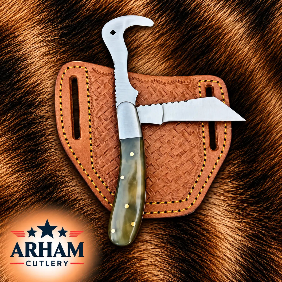 A folding knife with a polished silver blade and a green-brown handle with brass rivets, displayed in front of a brown leather sheath on a brown fur background. The ARHAM CUTLERY logo is visible in the bottom-left corner.