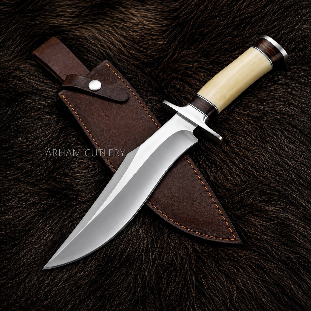A fixed-blade hunting knife with a polished steel blade, cream-colored handle, and dark brown leather sheath, displayed diagonally on a dark brown fur background. The brand name 'ARHAM CUTLERY' is watermarked across the center.