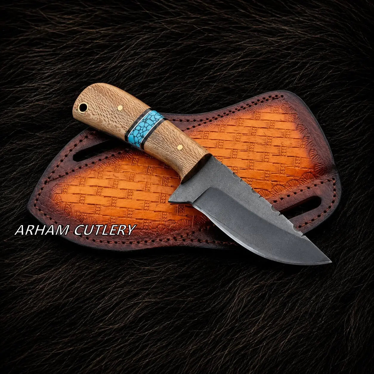 A fixed-blade knife with a textured wood handle and a dark steel blade, resting on a brown leather sheath over a dark fur background. The handle features a turquoise-colored woven band.