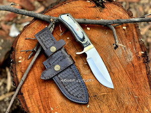 Handmade D2 steel hunting knife with brass guard and leather sheath by Arham Cutlery
