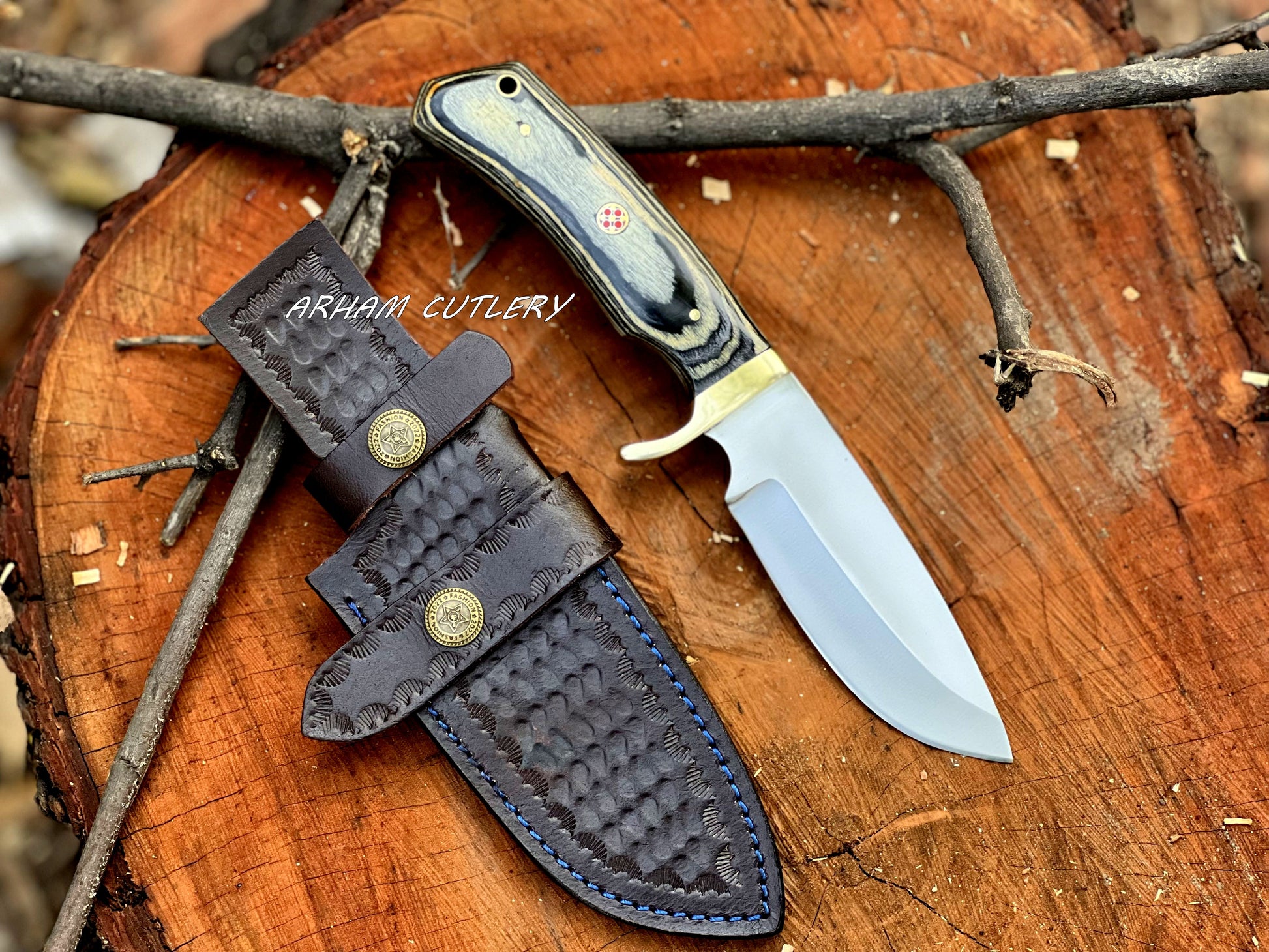 Handmade D2 steel hunting knife with brass guard and leather sheath by Arham Cutlery