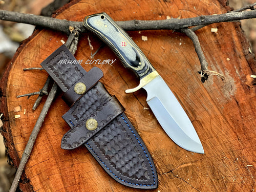 Handmade D2 steel hunting knife with brass guard and leather sheath by Arham Cutlery