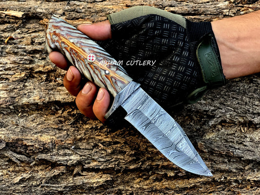Handmade Damascus steel knife with pine cone resin handle and leather sheath by Arham Cutlery