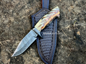 Handmade Damascus steel knife with pine cone resin handle and leather sheath by Arham Cutlery