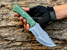 Cargar imagen en el visor de la galería, Handmade Damascus Steel Tracker Knife with Green G10 Handle, Bird Eye Pattern Blade, and Leather Sheath – Arham Cutlery
