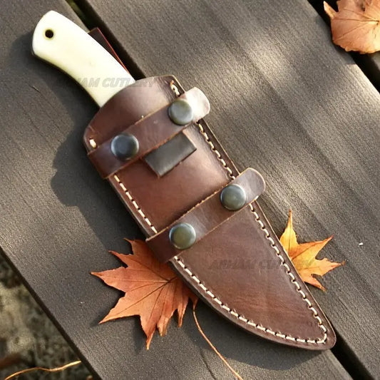 Handmade 1095 steel hunting knife with camel bone handle and steel bolster by Arham Cutlery