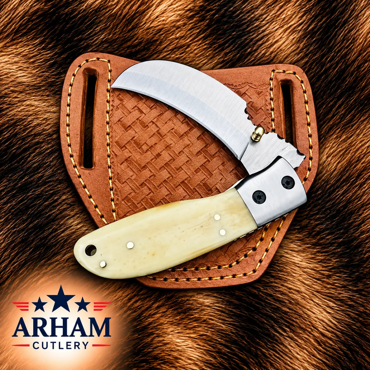 A folding knife with a curved silver blade and cream-colored bone handle, resting on a brown woven leather sheath over a brown fur background. The ARHAM CUTLERY logo is visible in the bottom-left corner.