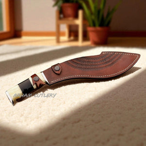 The Himalayan Talon handmade Kukri machete with stainless steel blade, bone and resin handle, and custom leather sheath by Arham Cutlery.