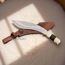 Cargar imagen en el visor de la galería, The Himalayan Talon handmade Kukri machete with stainless steel blade, bone and resin handle, and custom leather sheath by Arham Cutlery.
