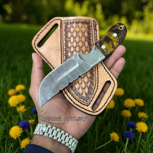 Handmade Damascus steel cowboy knife with colorful resin handle, steel bolster, and leather belt sheath by Arham Cutlery