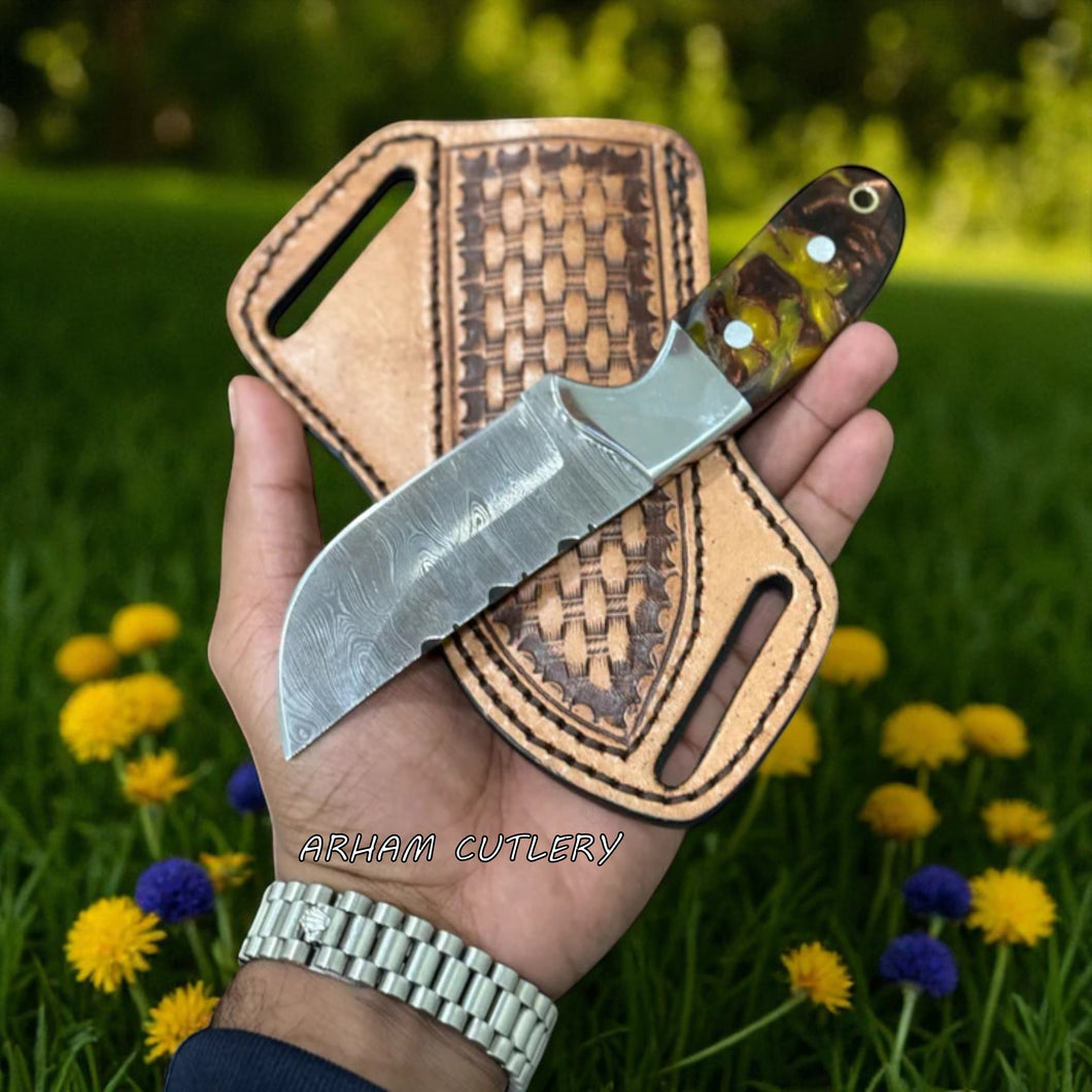 Handmade Damascus steel cowboy knife with colorful resin handle, steel bolster, and leather belt sheath by Arham Cutlery