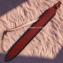 Cargar imagen en el visor de la galería, UlfSune Damascus Viking Sword with brass wolf guard, leather-wrapped handle, and back-carry red leather sheath – Arham Cutlery
