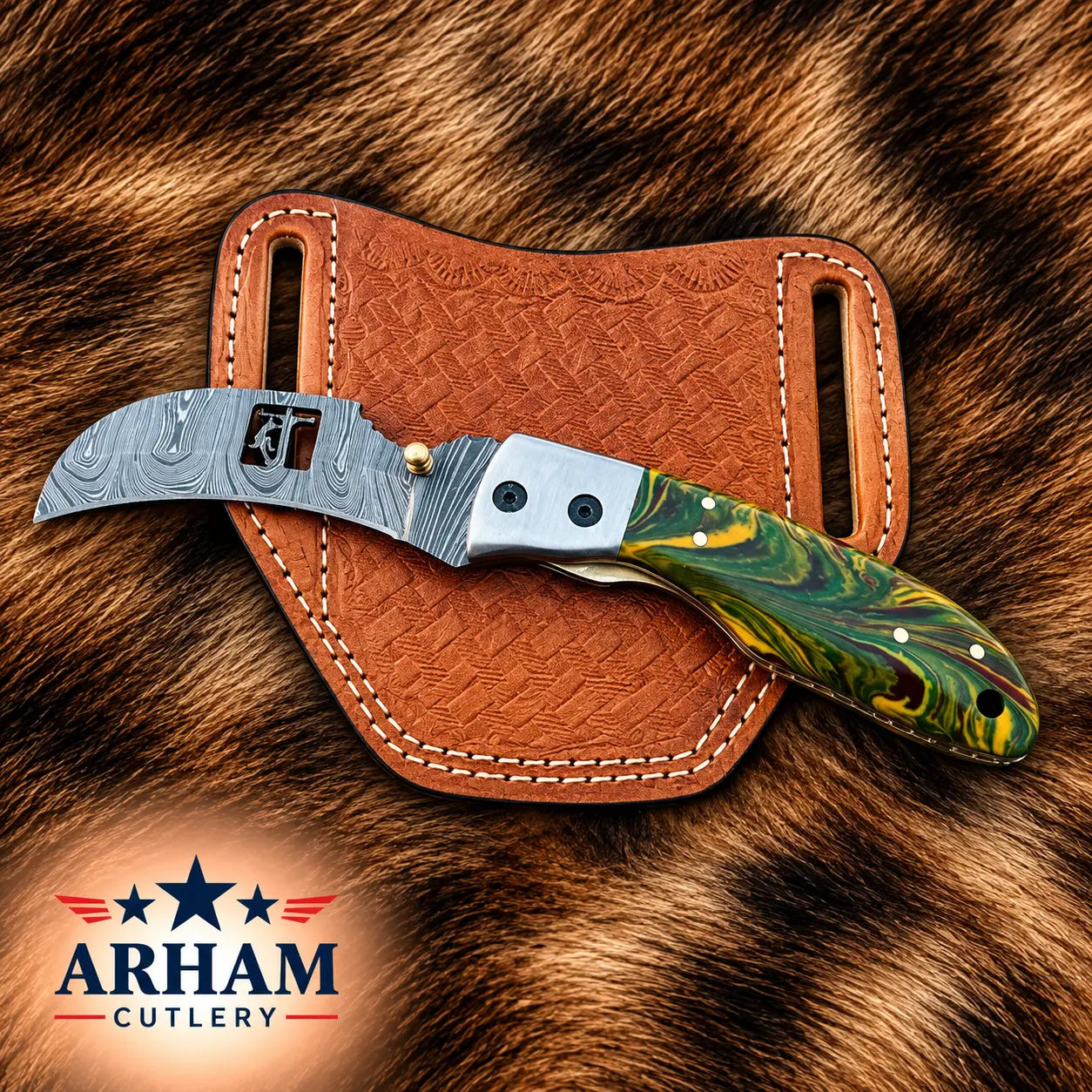 A folding pocket knife with a patterned steel blade and a green marbled handle, displayed on a brown leather sheath over a brown animal fur background. The ARHAM CUTLERY logo is visible in the bottom-left corner.